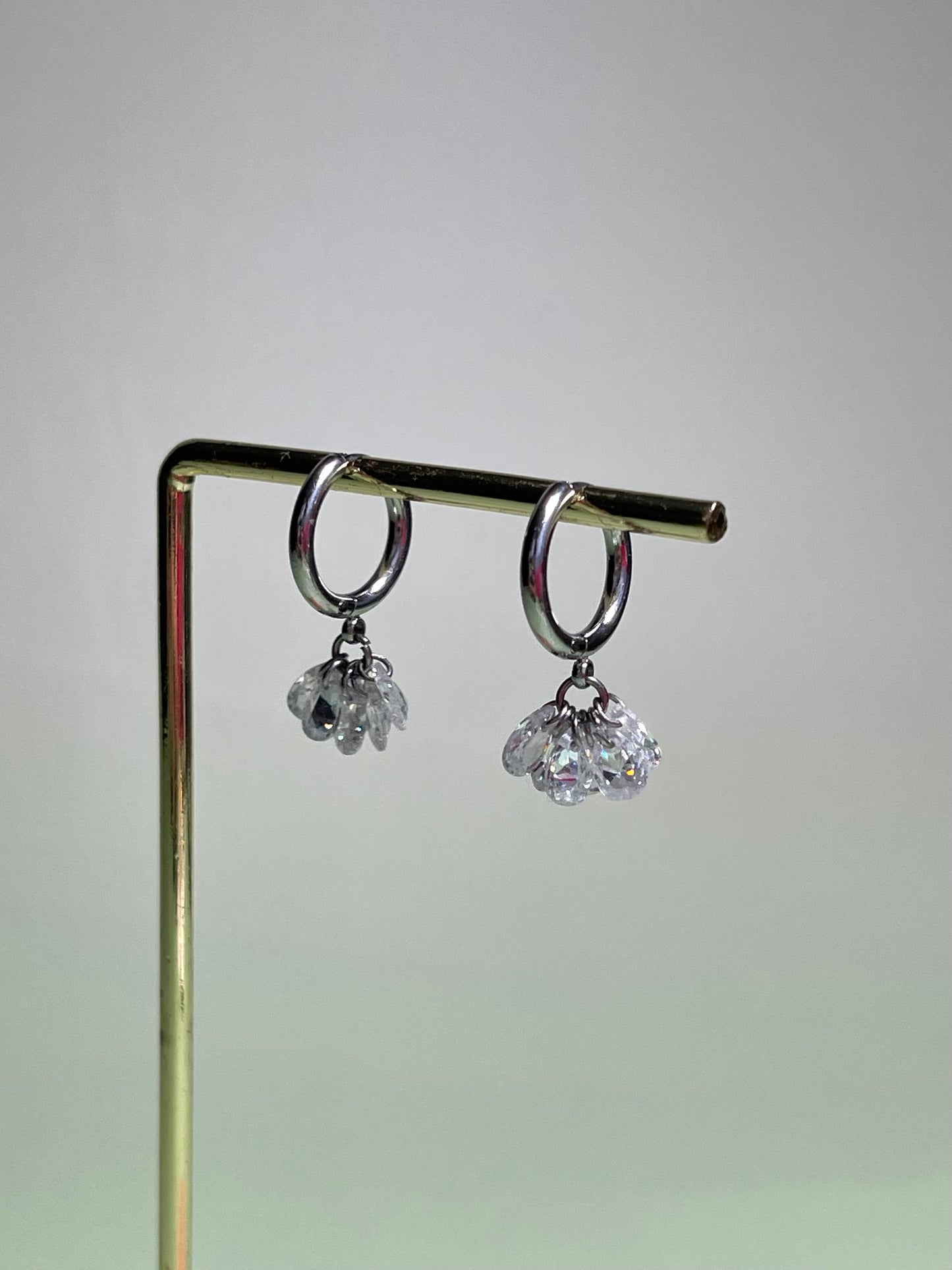 Par de aros plateados brillitos