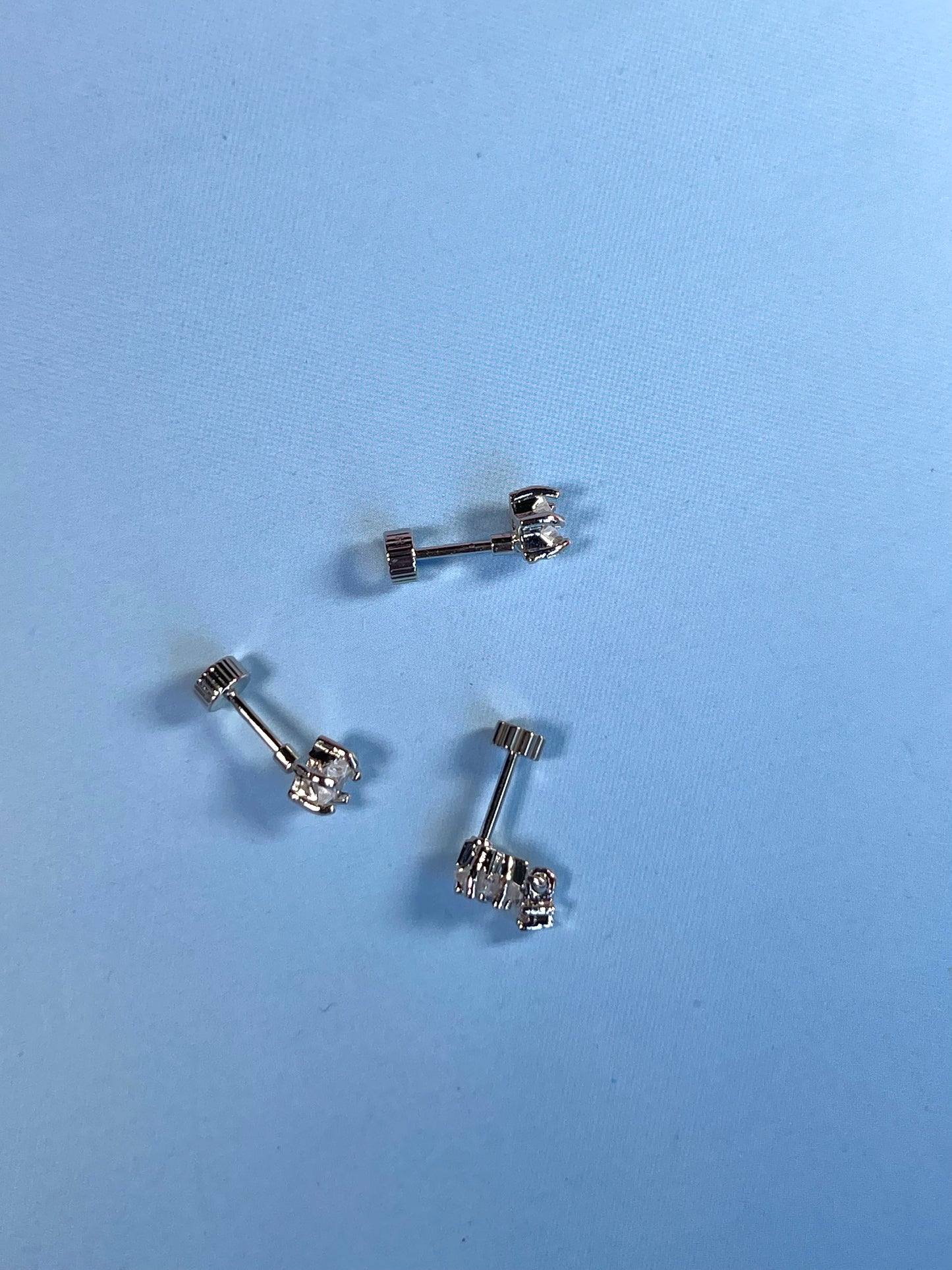 Pendiente/piercing estrella simple plateado (unidad)