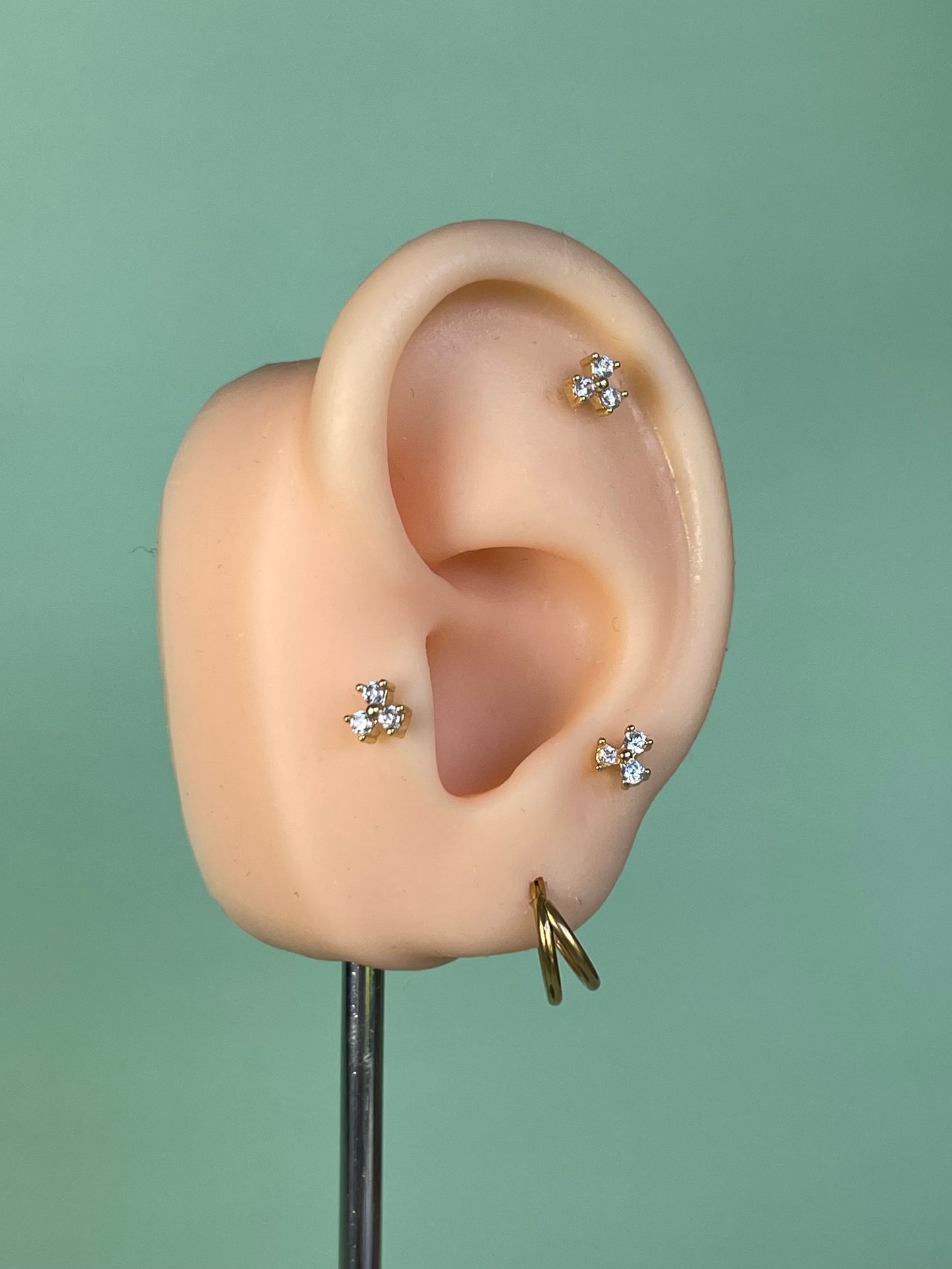 Pendiente/piercing “Trinity” dorado