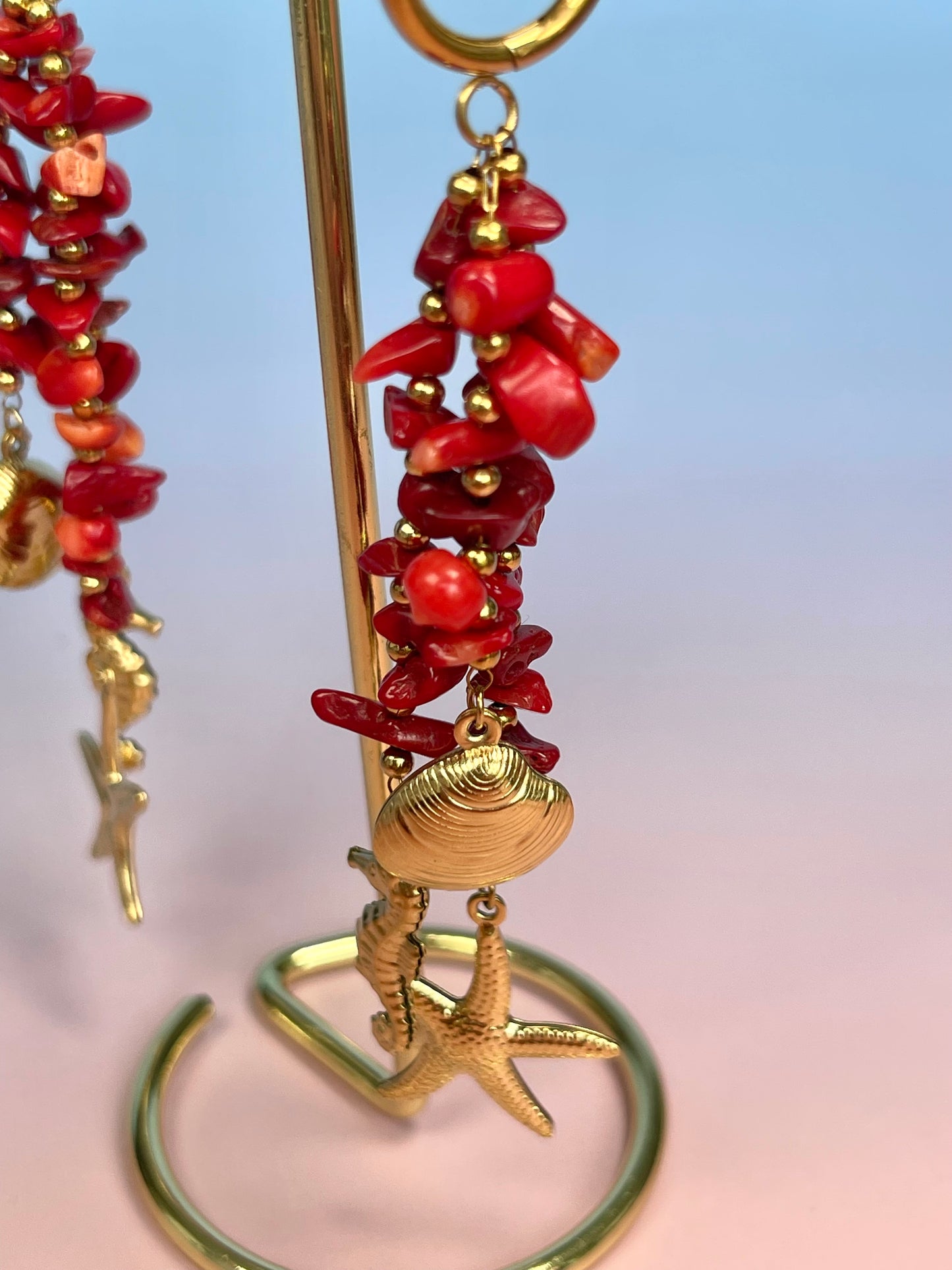 Par de pendientes triple mar