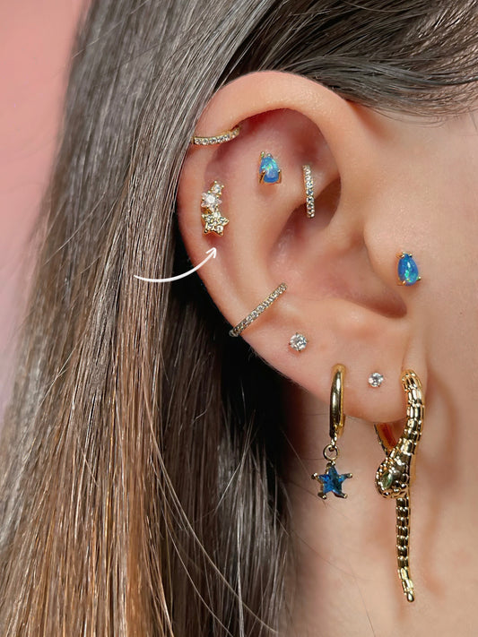 Pendiente/piercing triple estrella brillante (unidad)