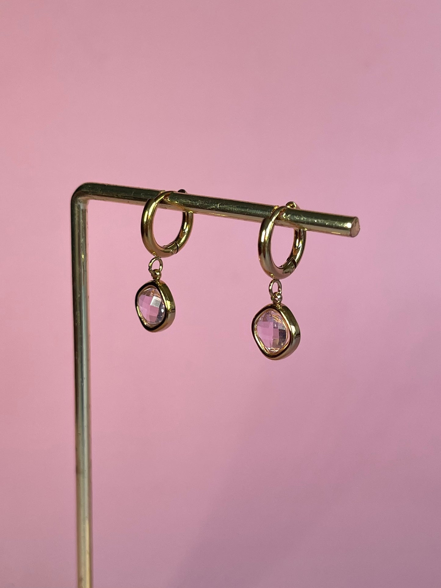 Par de pendientes círculo rosa
