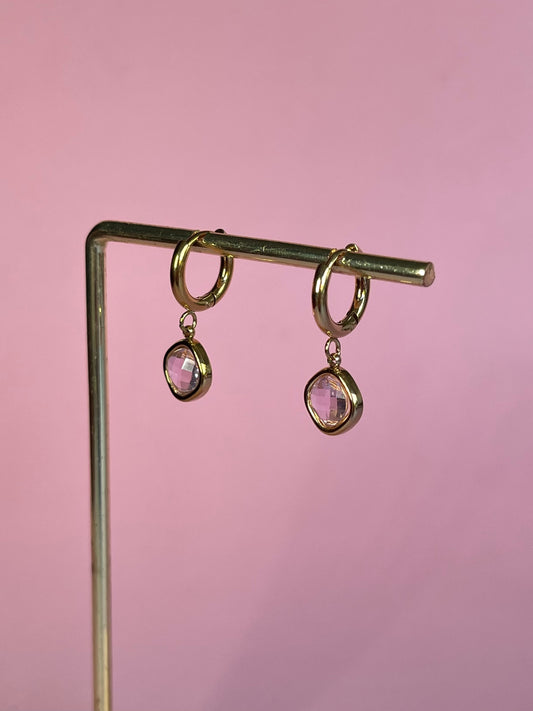 Par de pendientes círculo rosa