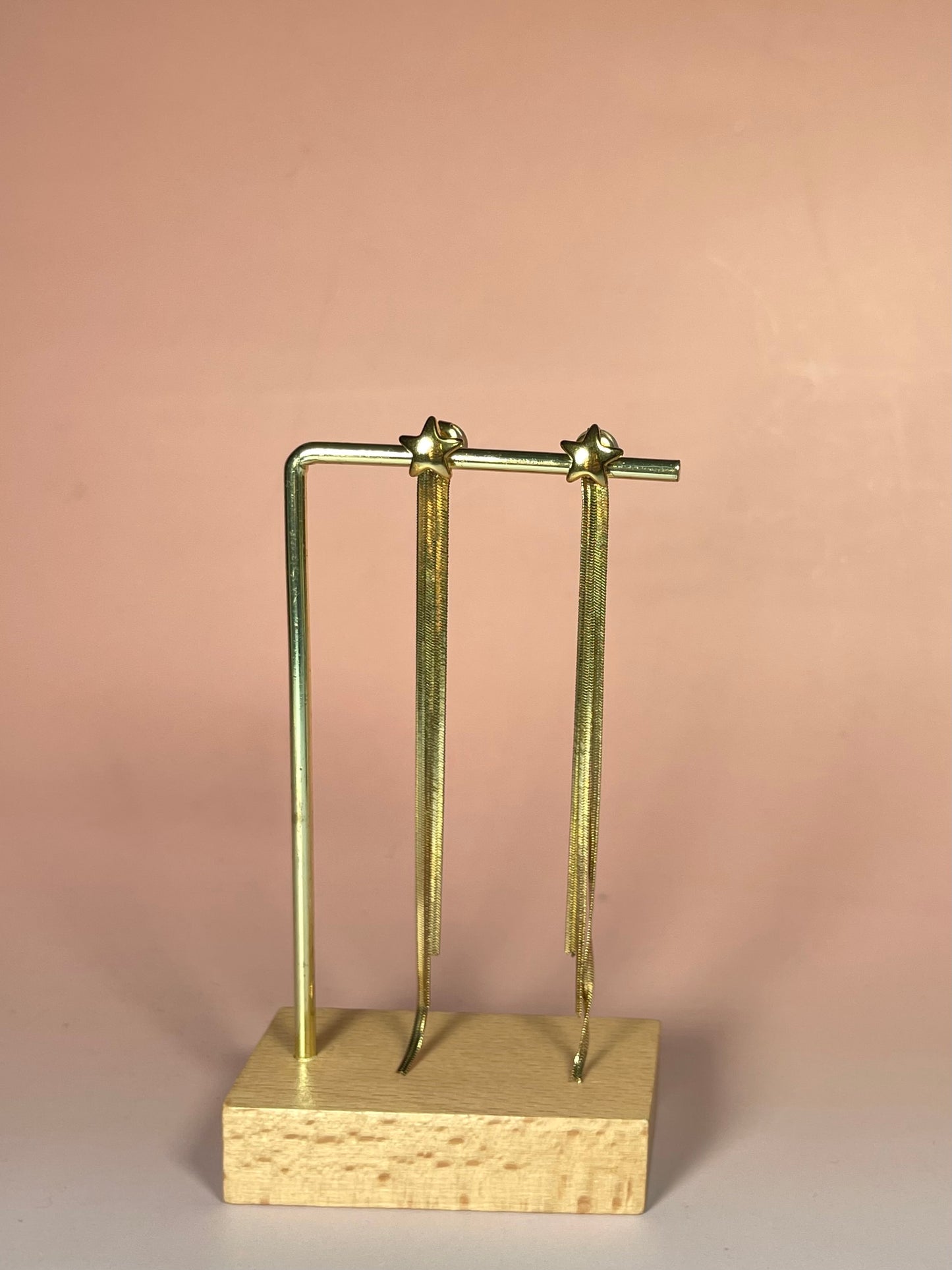 Par de pendientes cascada dorado