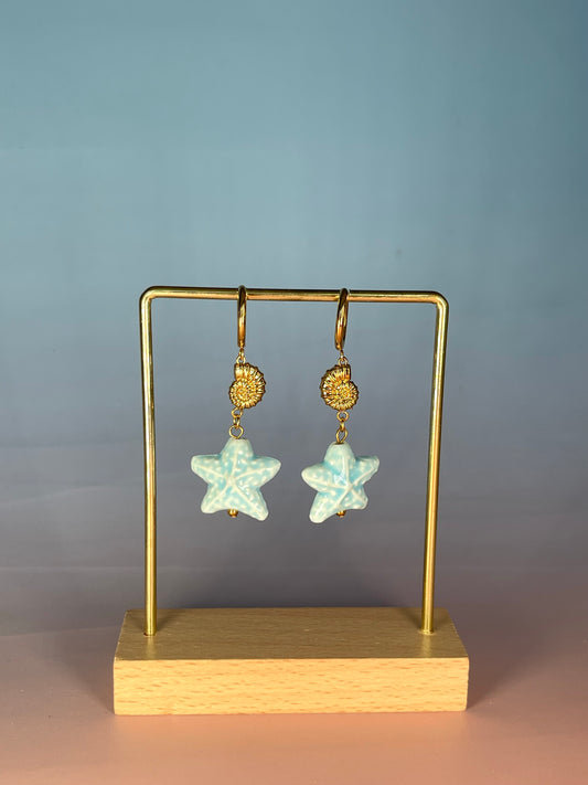 Par de pendientes caracola