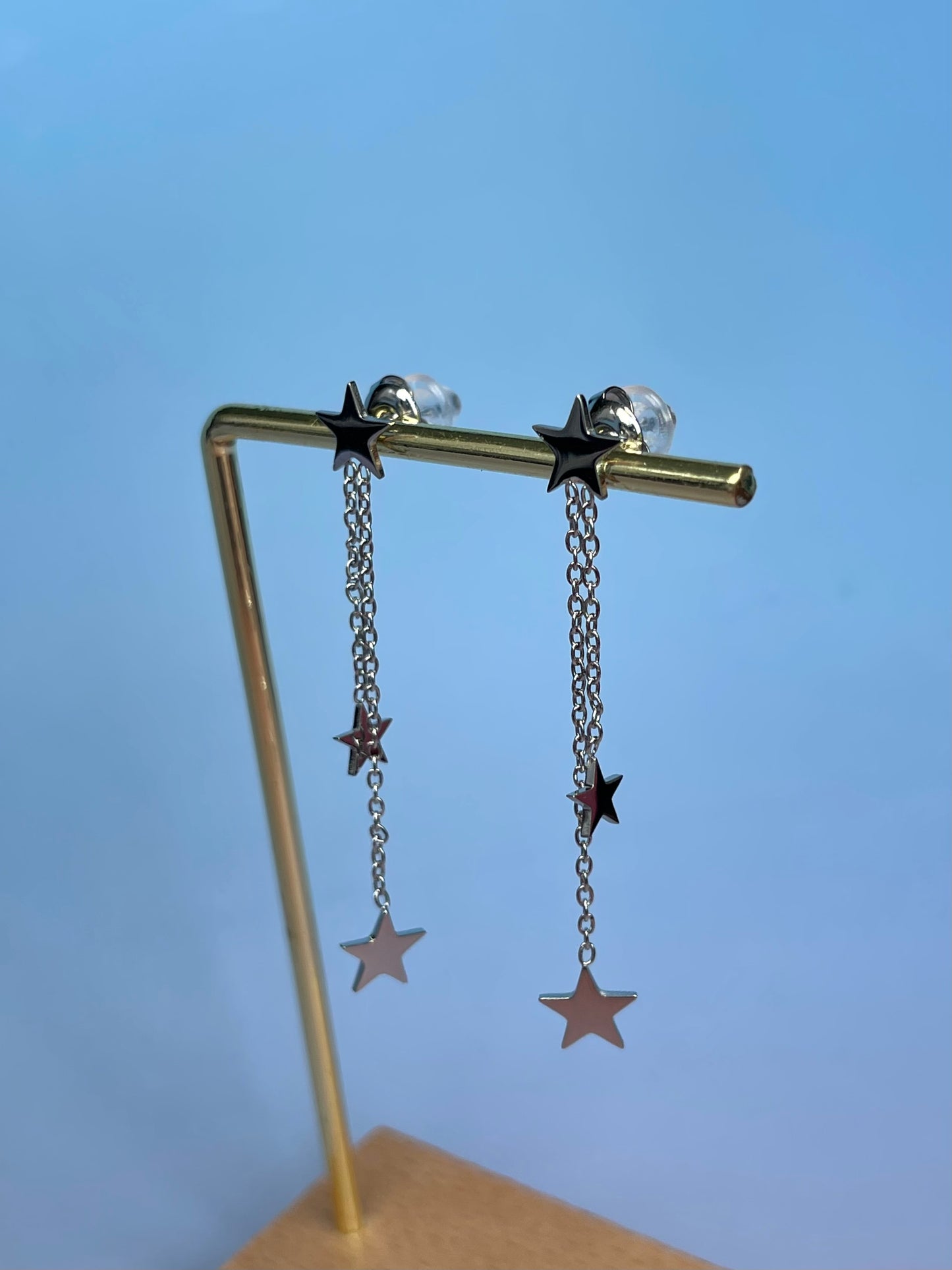 Par de pendientes estrellitas plateada