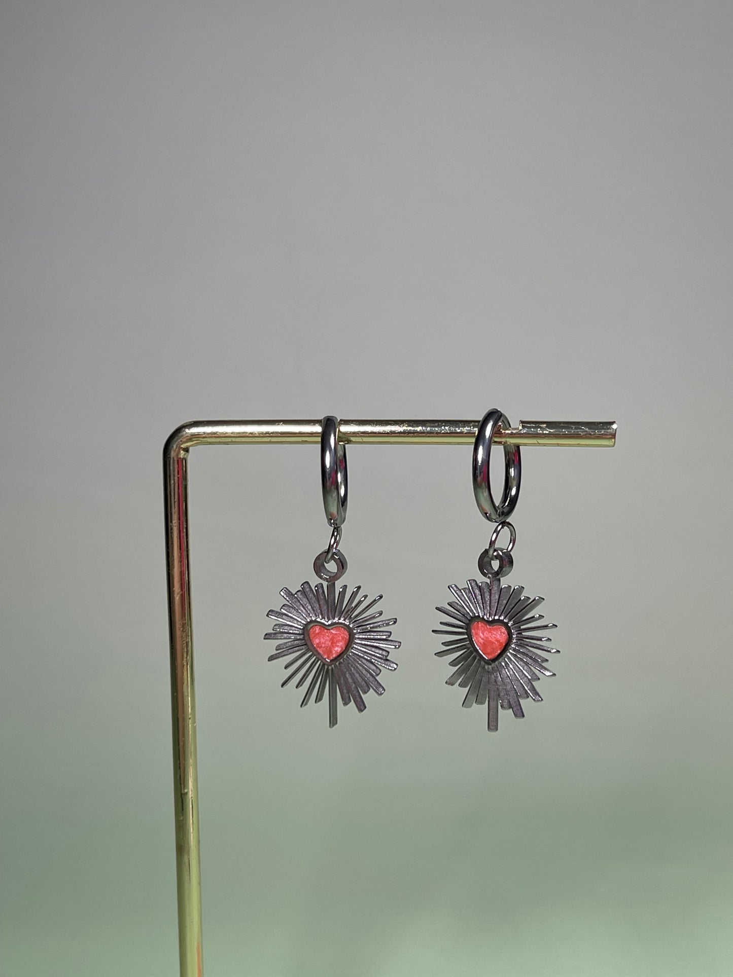 Par de Pendientes aro corazón plateado