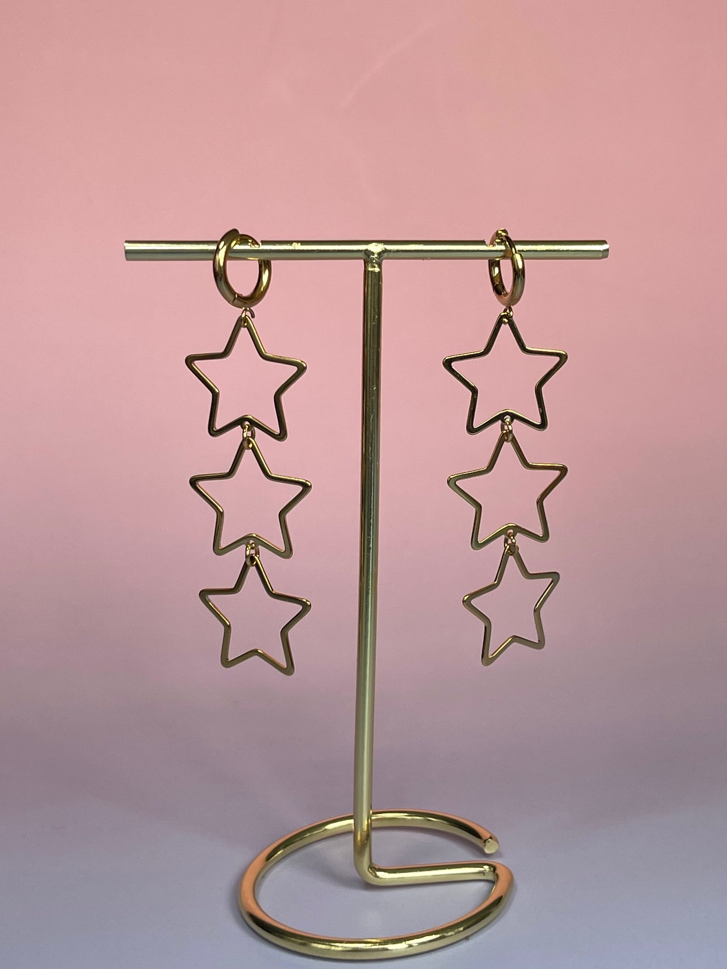 Par de pendientes colgantes triple estrella